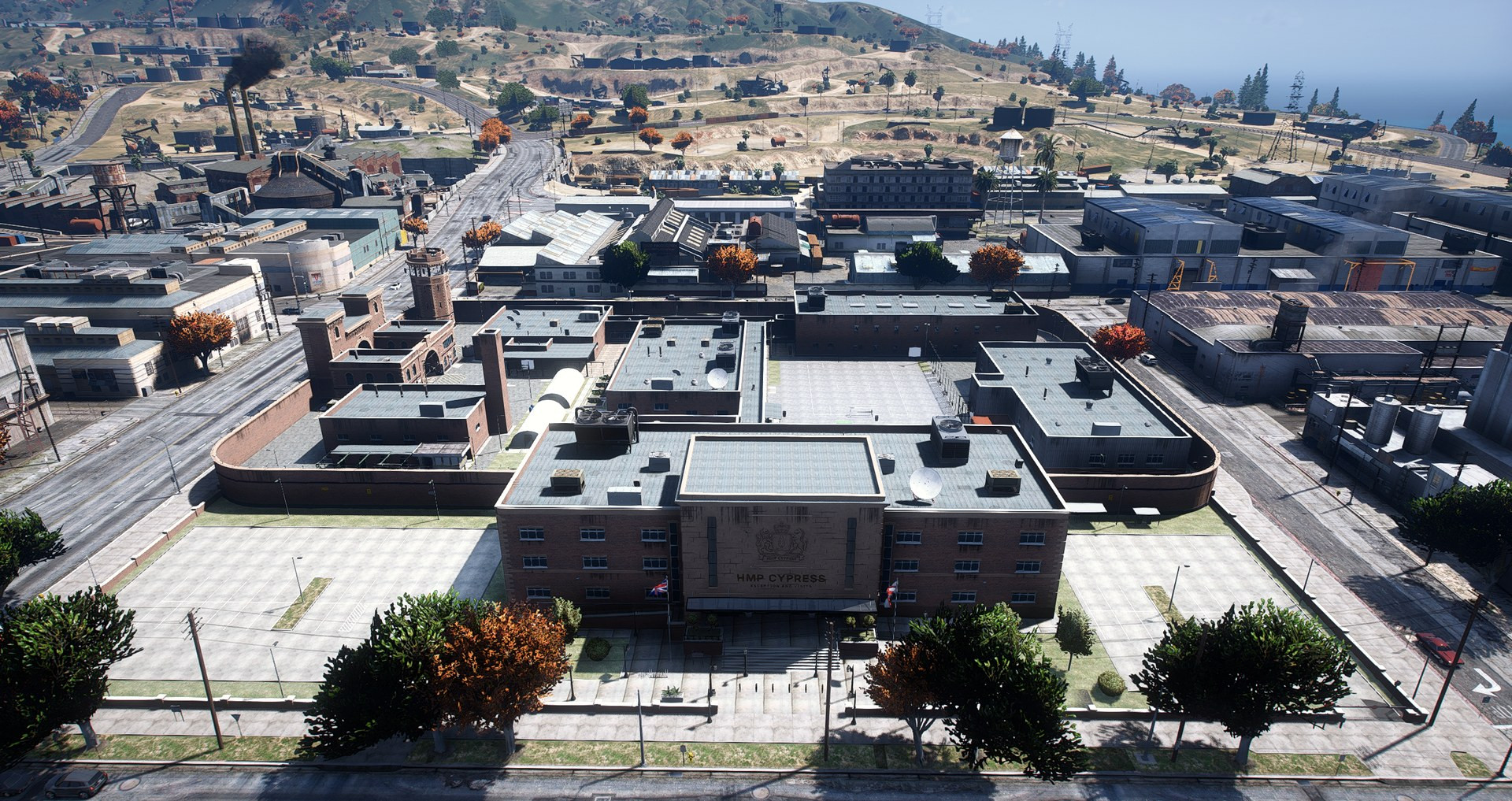 HMP Cypress from the air: the wings, exercise yard and Victorian gatehouse behind the perimeter wall