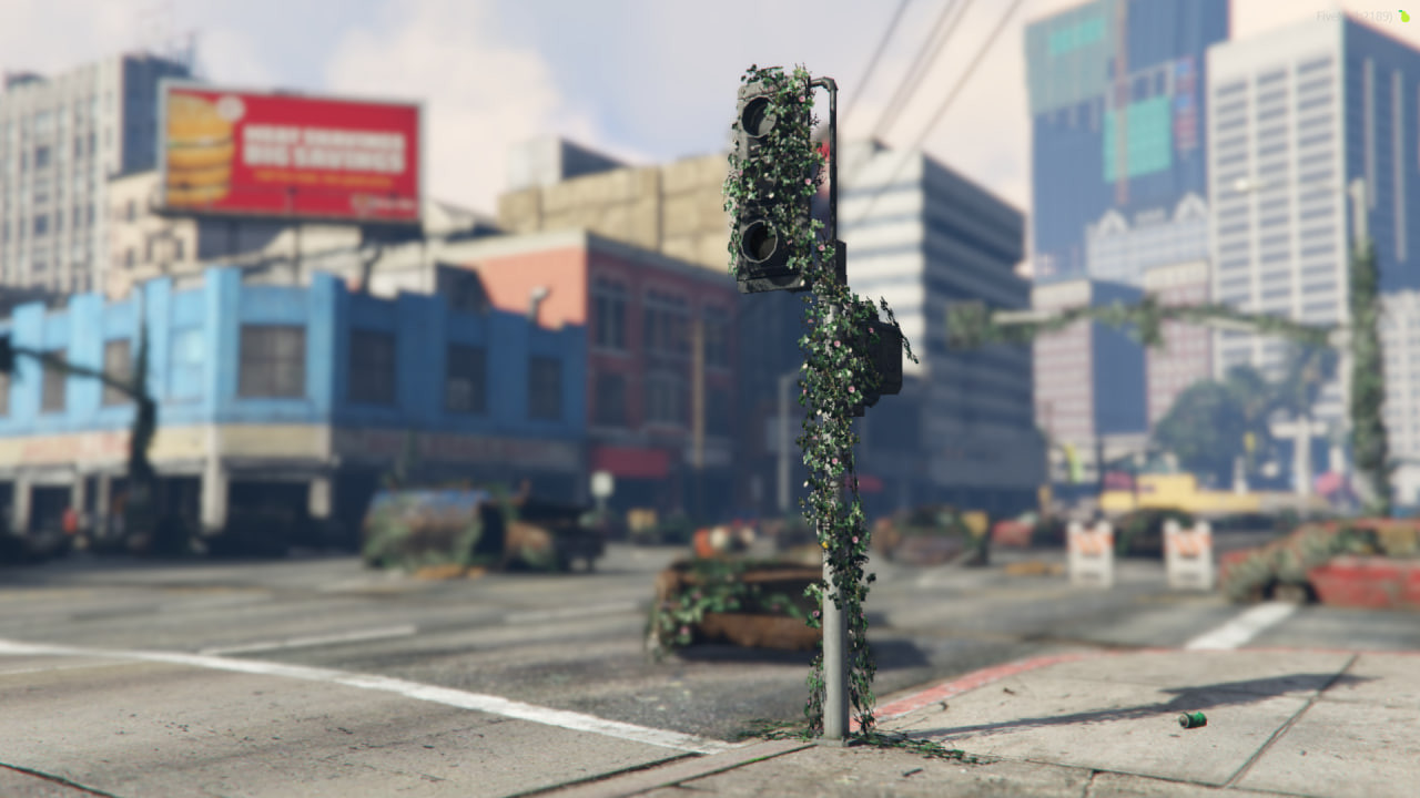 Traffic light covered with grass 3